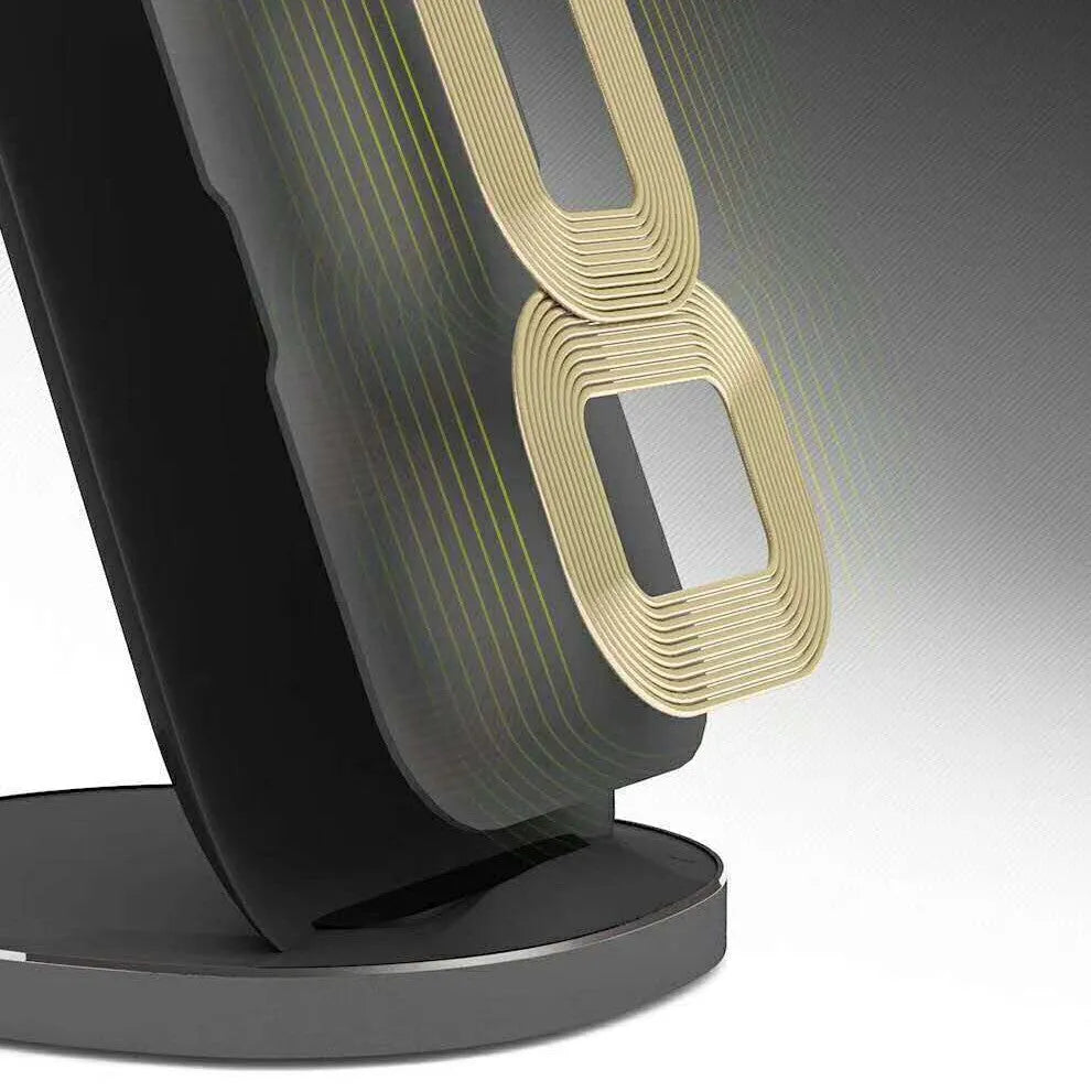 Vertical wireless charging dock in black colour charging smartphone upright on desk