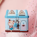 Blue house-shaped tinplate piggy bank on desktop for coin storage