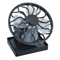 Black portable solar fan panel with clip, shown in an outdoor setting.