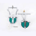 Korean dental articulator with metal frame and adjustable central pin