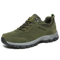Men's low-top hiking shoe in army green with mesh upper and casual design.