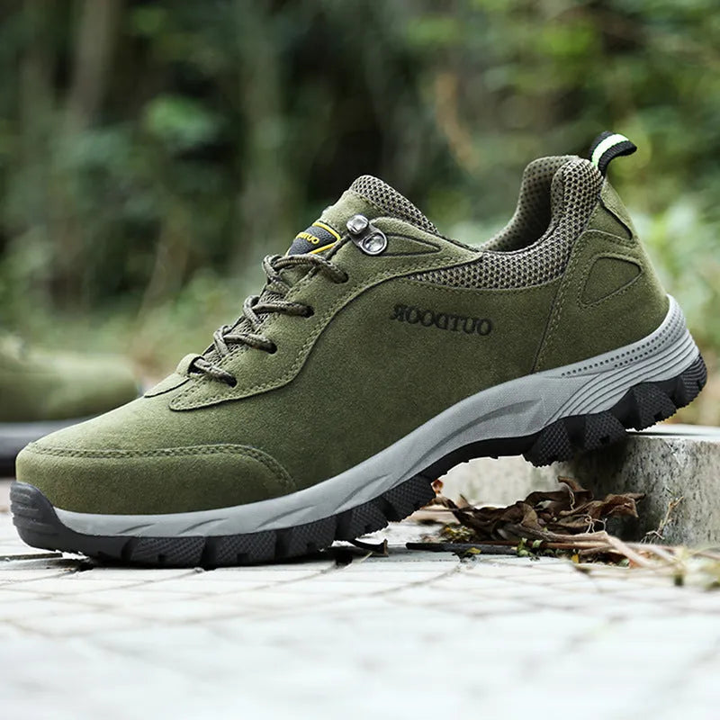 Men's low-top hiking shoe in army green with mesh upper and casual design.