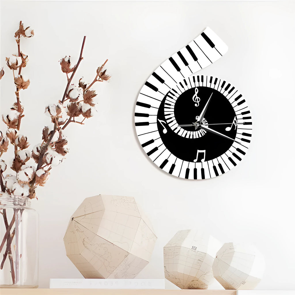 Black and white treble clef shaped wall clock with piano keyboard design and musical notes