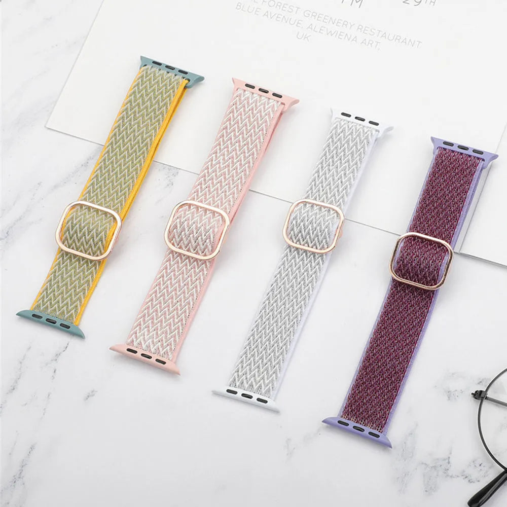 Braided nylon elastic strap for Apple Watch in various colours on a grey background.