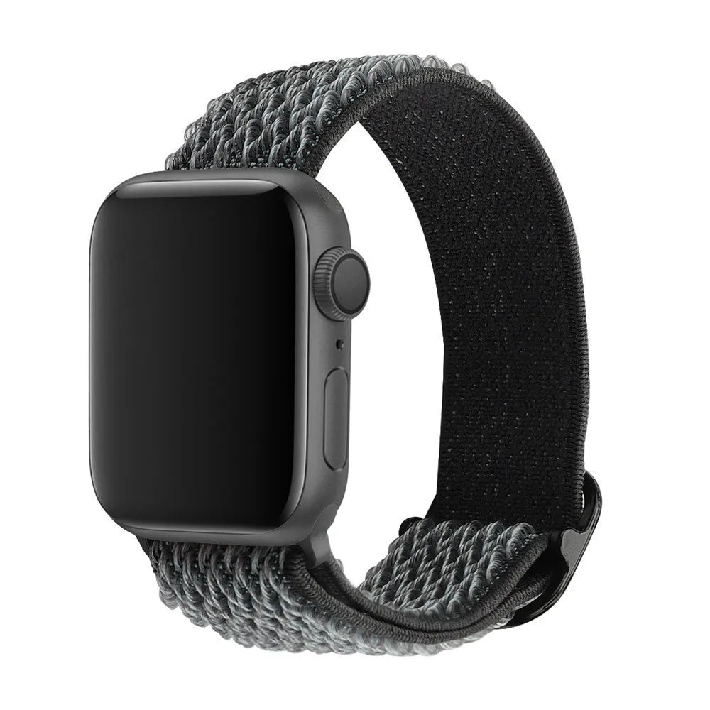 Braided nylon elastic strap for Apple Watch in various colours on a grey background.