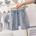 Baby boy cotton denim shorts in blue milk pudding style showing front view