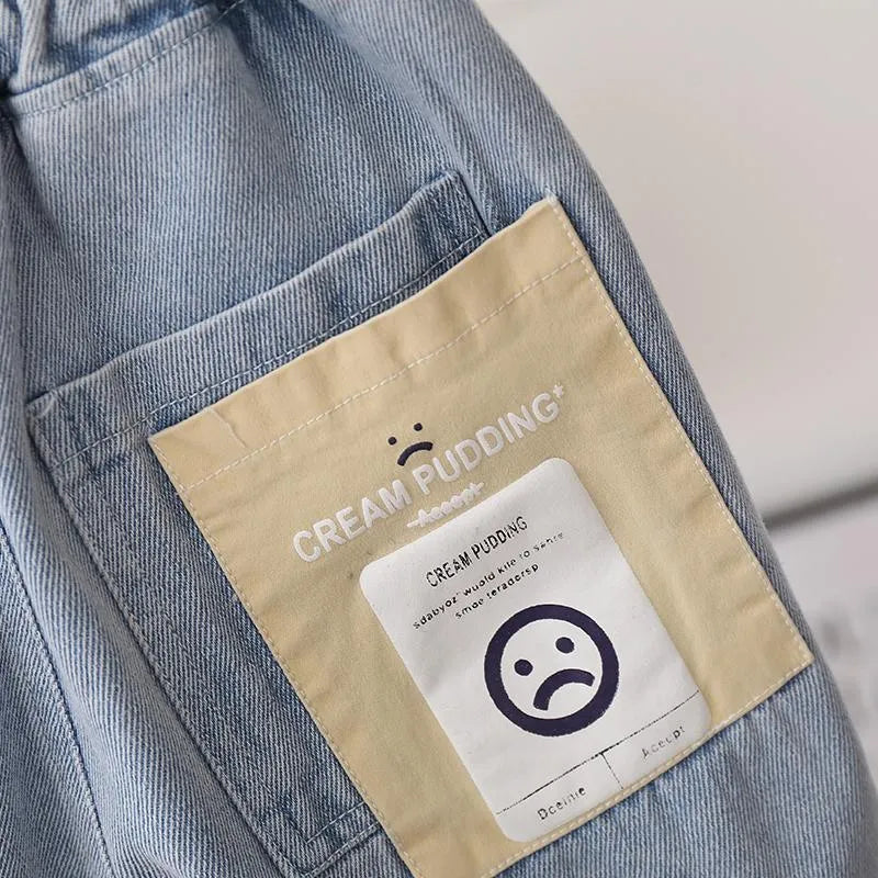 Baby boy cotton denim shorts in blue milk pudding style showing front view