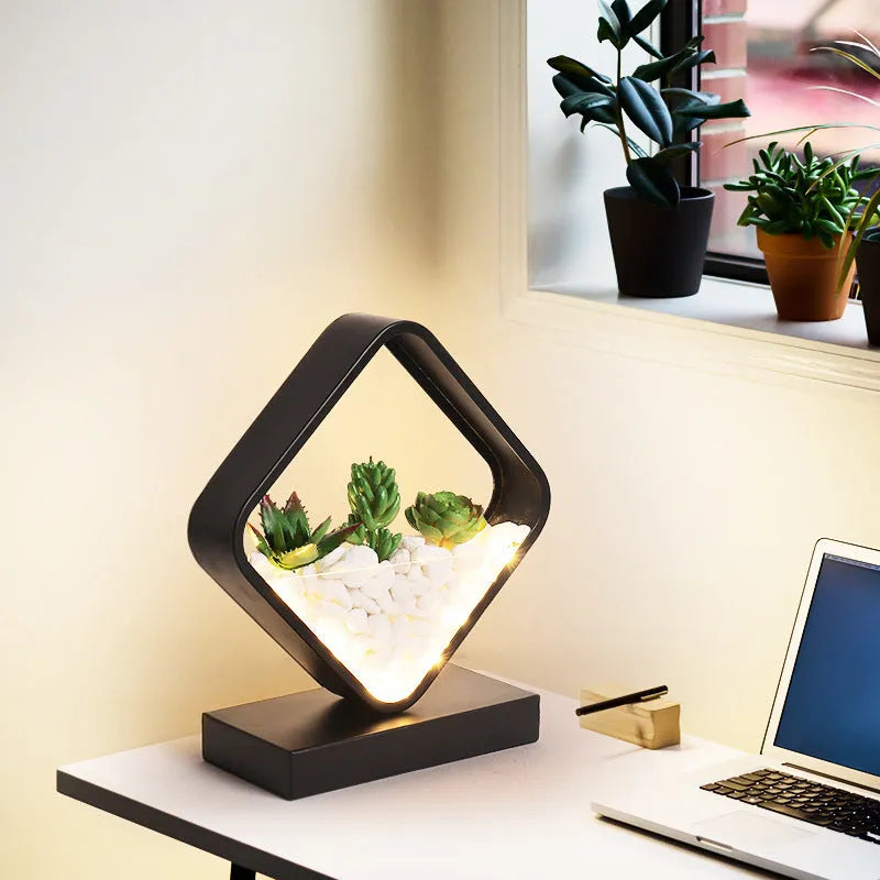 Black table lamp with creative succulent plant design and metal lamp holder