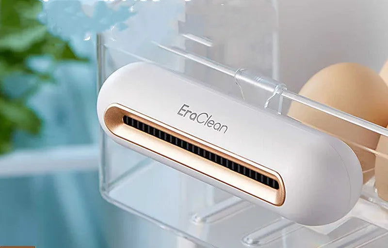Rose gold refrigerator deodorant sterilizer with USB cable for car and small space air purification.