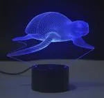 Colour-changing LED table lamp with acrylic panel on black ABS base, showing touch controls and USB cable