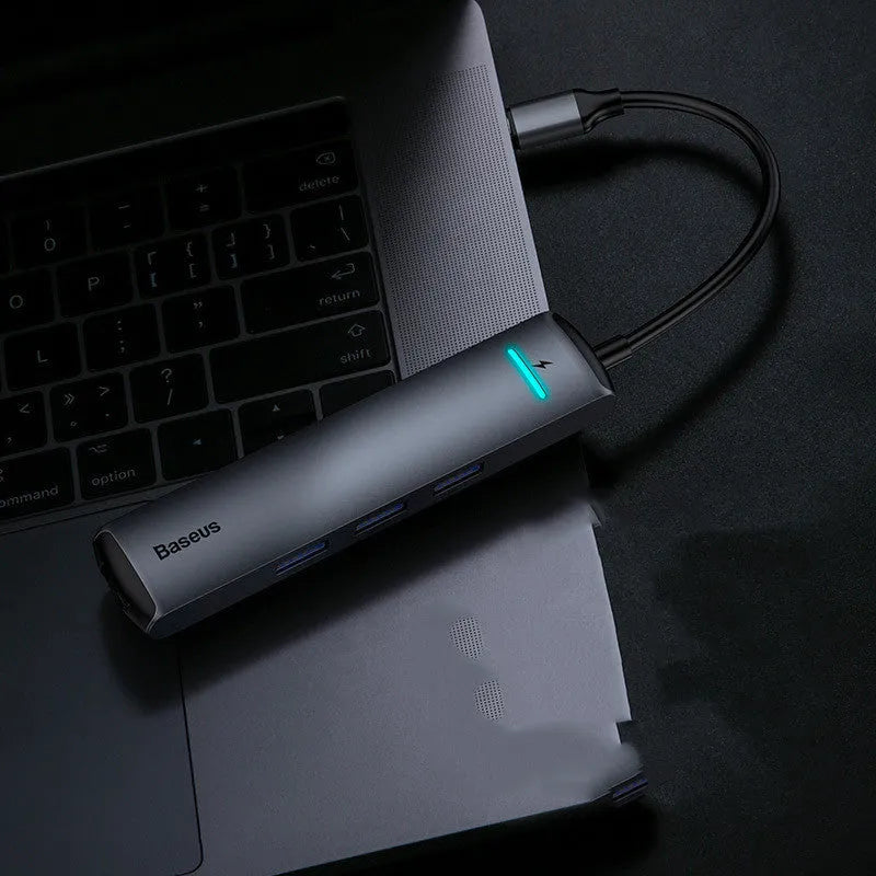 Dark grey Type-C docking station hub compatible with Apple MacBook and iPhone models with 5Gbps transfer rate