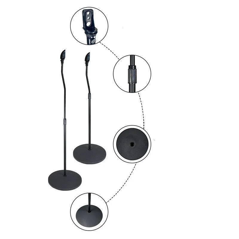 Black tripod speaker stand holding bookshelf satellite speaker with iPhone placed on optional silicone seat