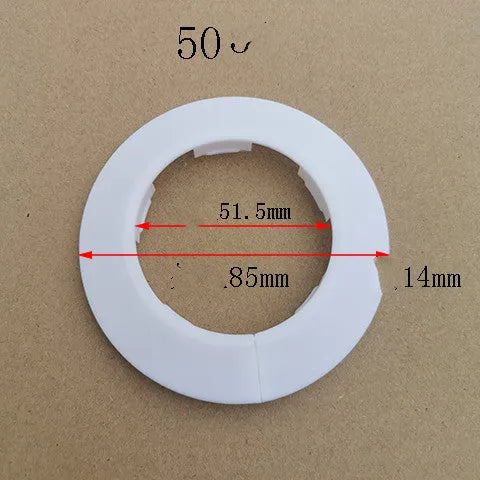 White plastic water pipe decoration ring for wall air-conditioning hole cover on a white wall