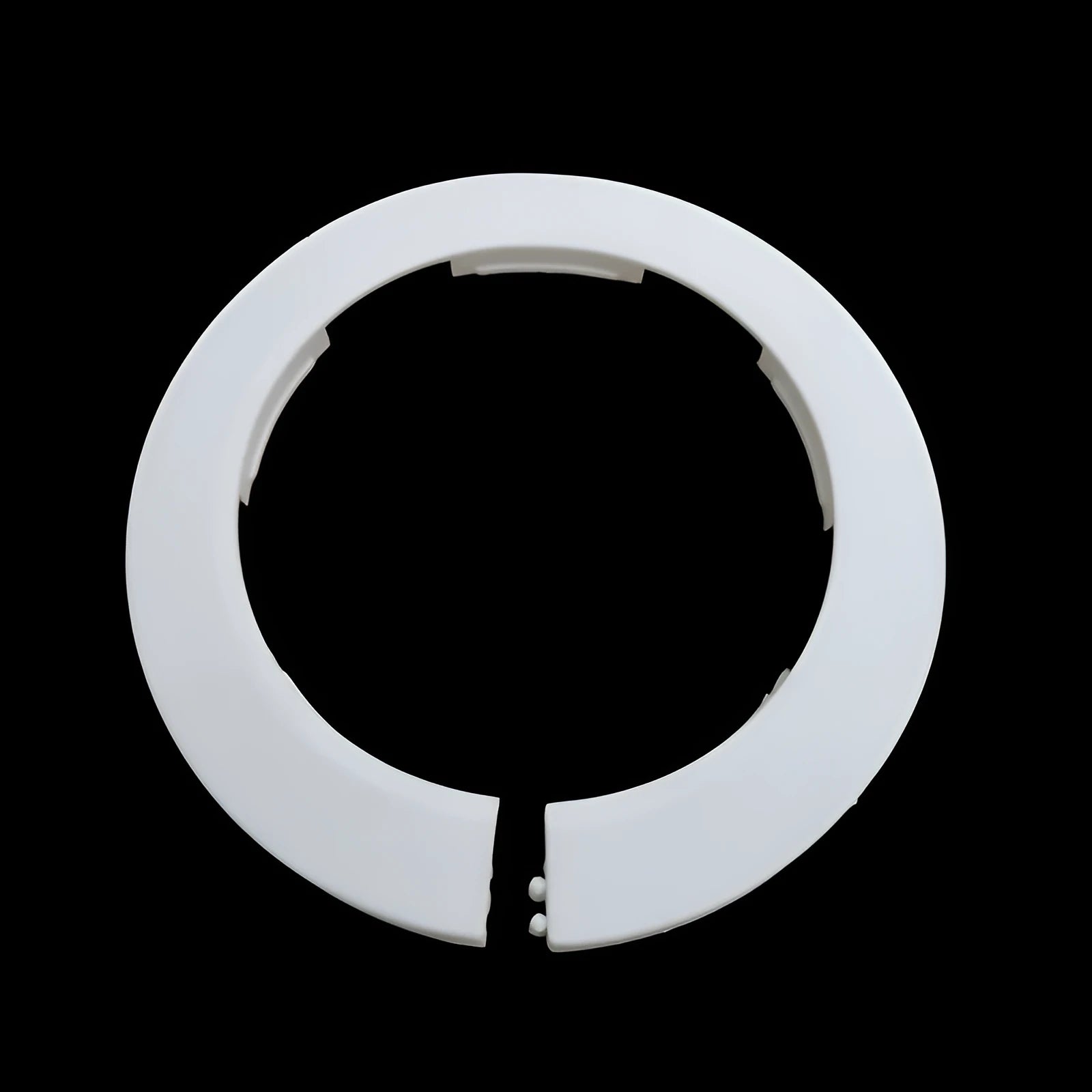 White plastic water pipe decoration ring for wall air-conditioning hole cover on a white wall