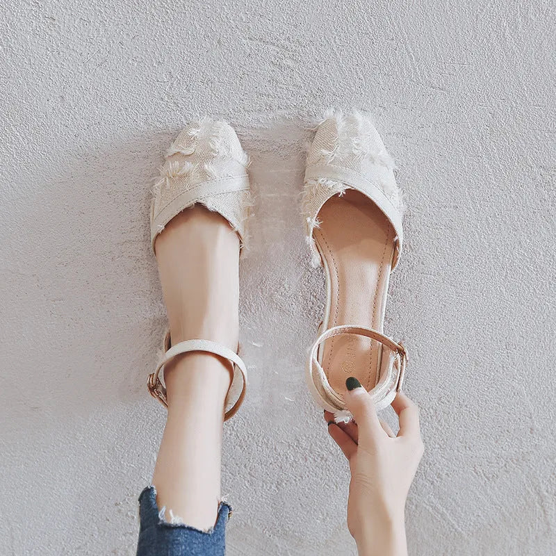 Women's apricot suede D'Orsay flat shoes with an ankle strap and a low 3cm heel on a plain background.