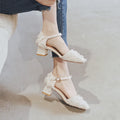 Women's apricot suede D'Orsay flat shoes with an ankle strap and a low 3cm heel on a plain background.