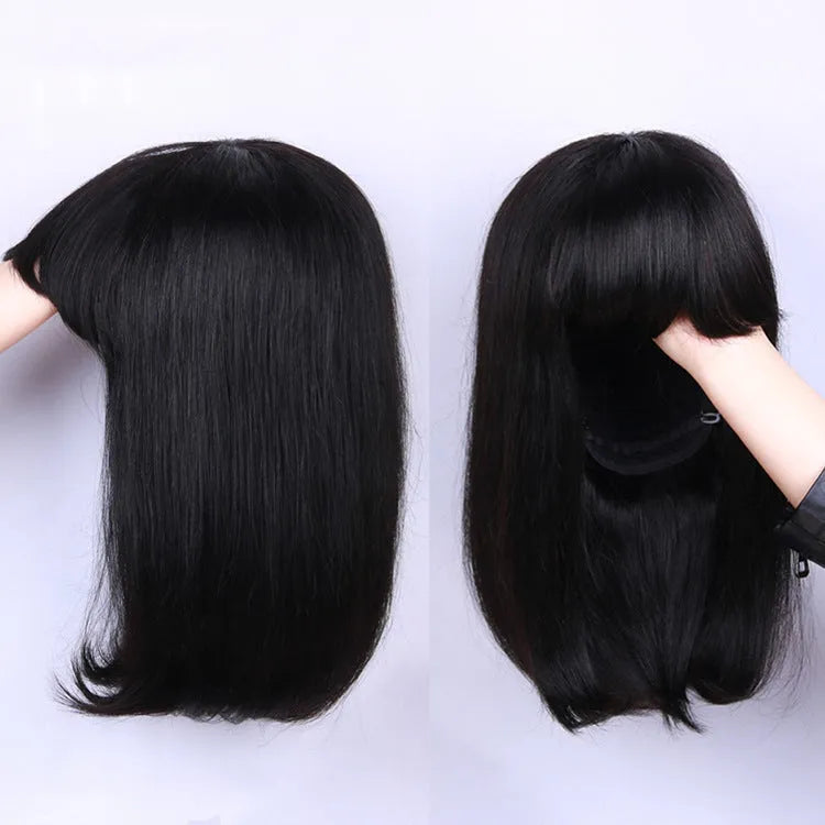 A Black human hair wig with short to medium length on an adjustable 10-inch wig cap.
