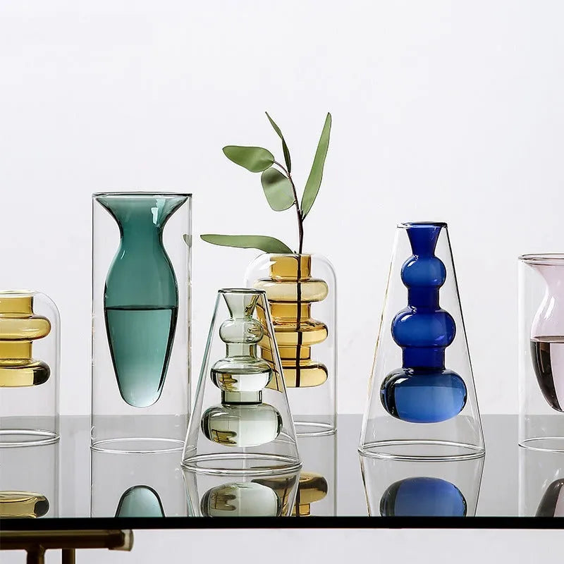 Small colourful double layer blown glass vase for dried flowers, yellow colour option on a table