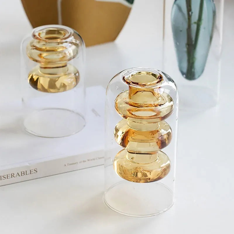 Small colourful double layer blown glass vase for dried flowers, yellow colour option on a table