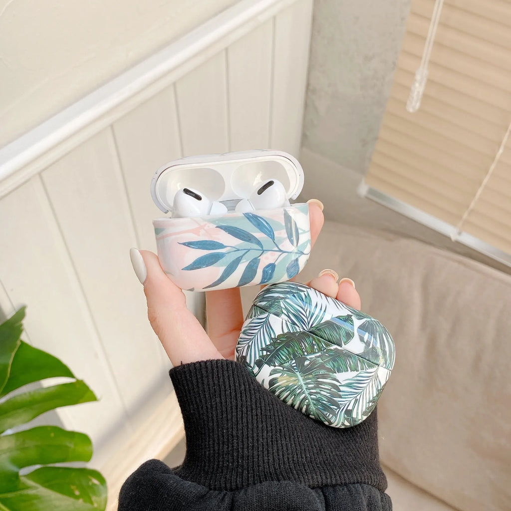 Blue and green banana leaf design soft TPU protective case for AirPods 1/2 and AirPods Pro.