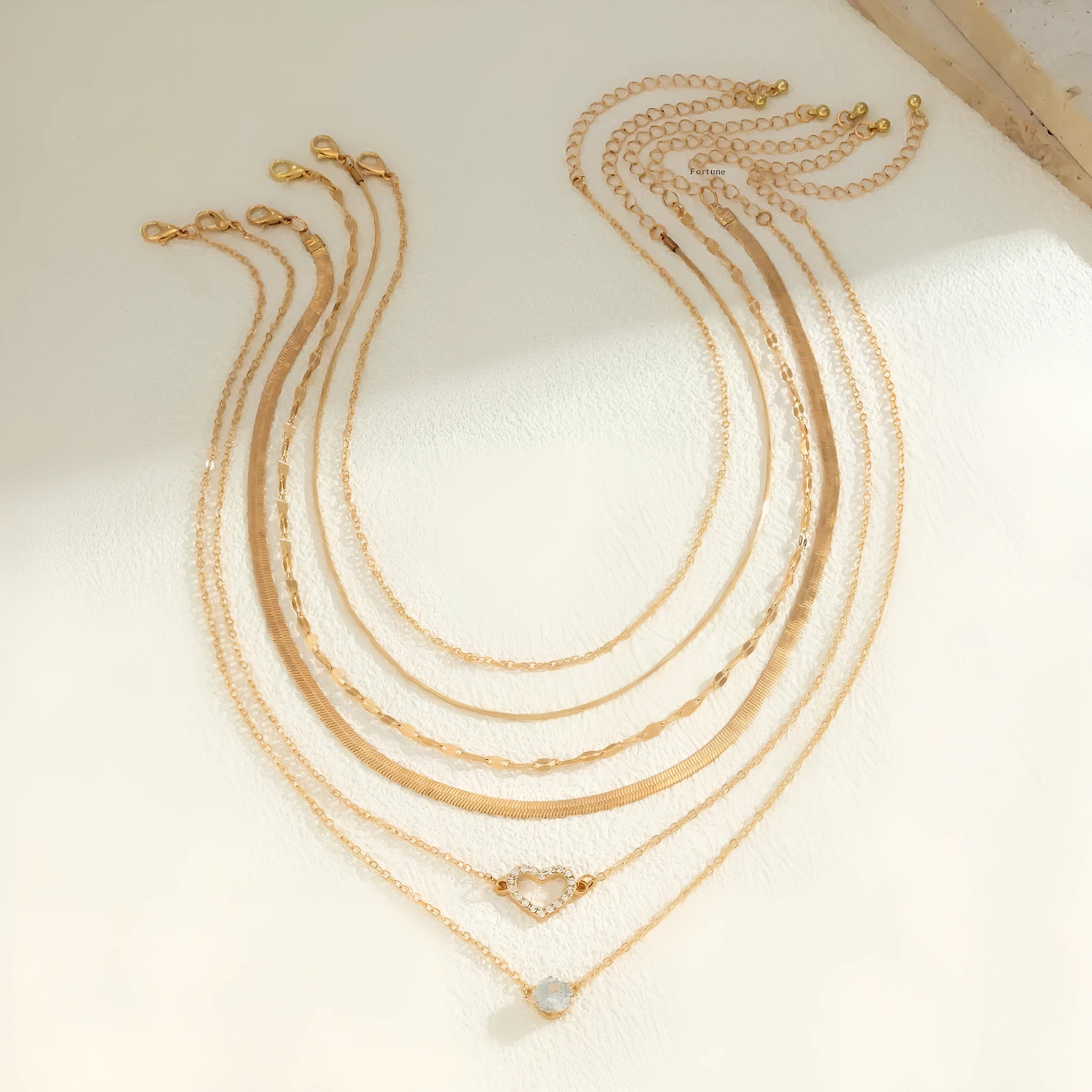 Alloy heart pendant necklace on metal snake bone chain with electroplated finish