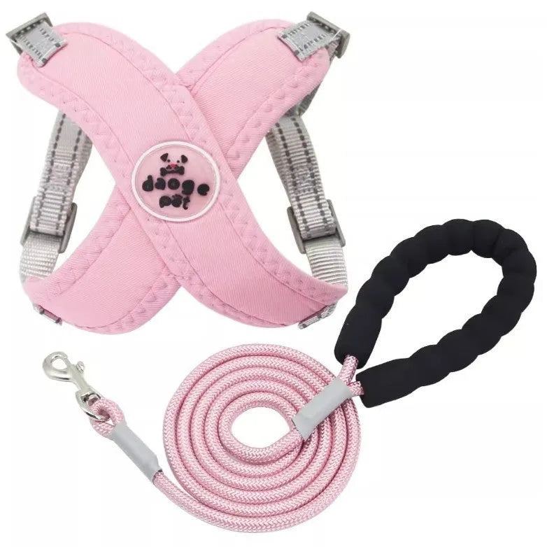 A blue dog vest with an integrated back handle and an attached matching leash rope.