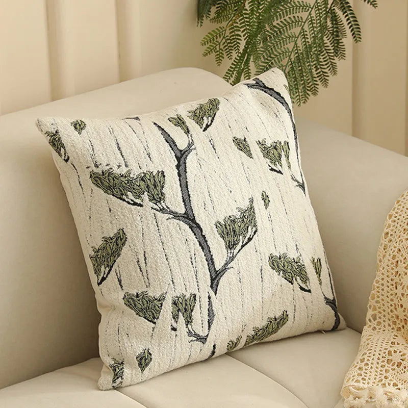 Close-up of a textured jacquard floral pillow cover in a 45cm square size, showcasing yarn-dyed pattern details.