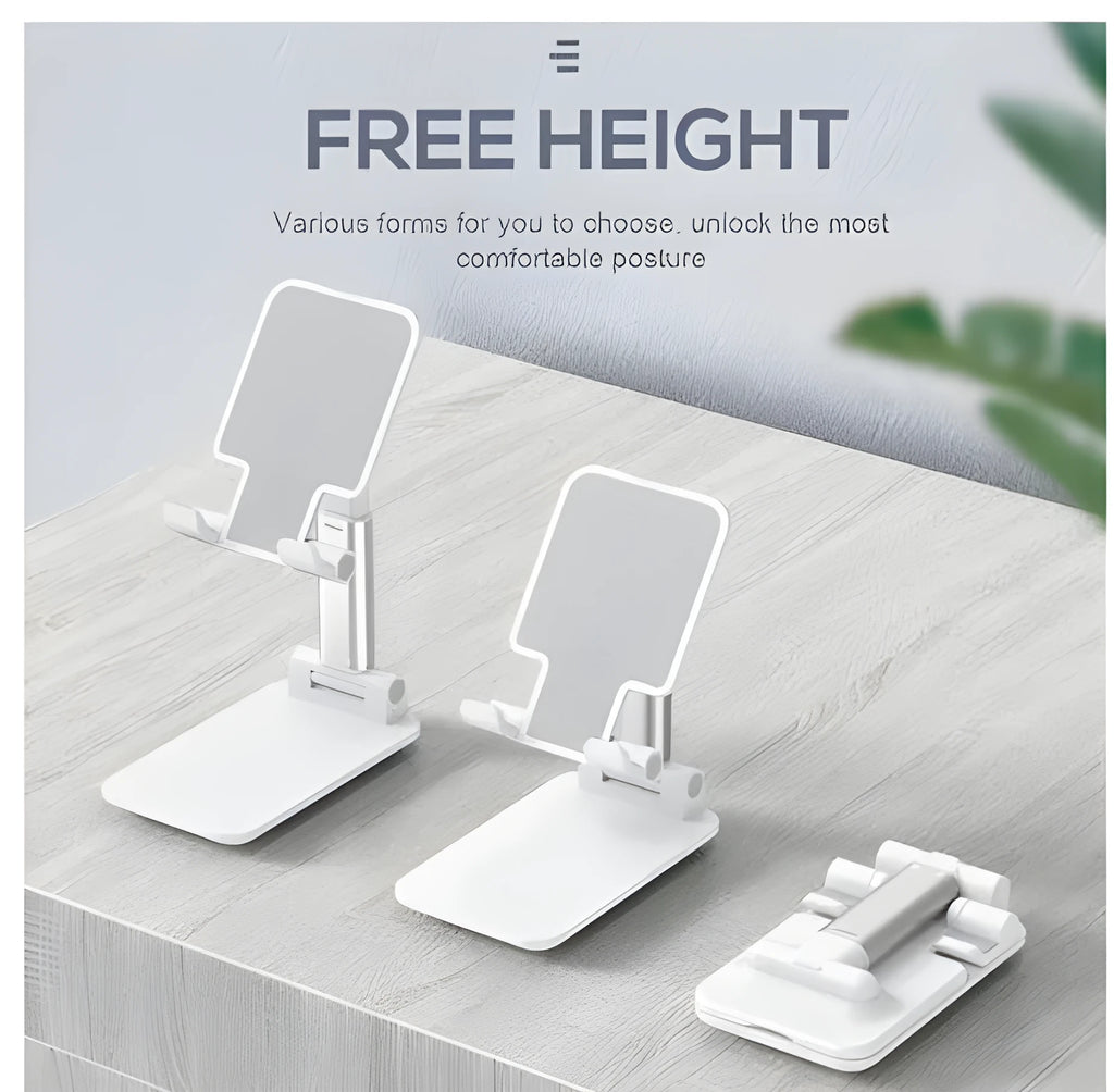Black, white, green, and pink silicone and ABS plastic desk mobile phone holder on a wooden table.