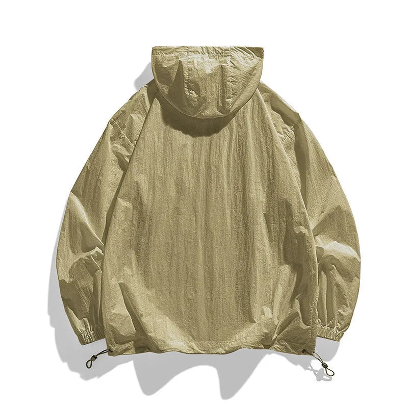 Lightweight beige hooded spandex sun protection jacket for men and women on a hanger.