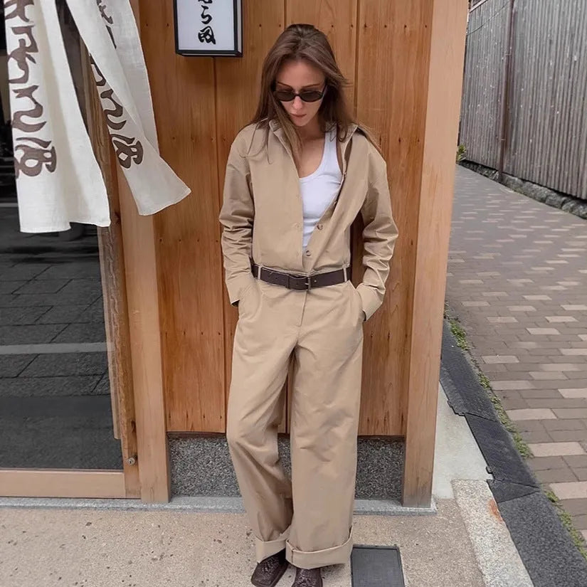 Khaki cargo overalls with drop-shoulder sleeves and mid-waist trouser cut front view