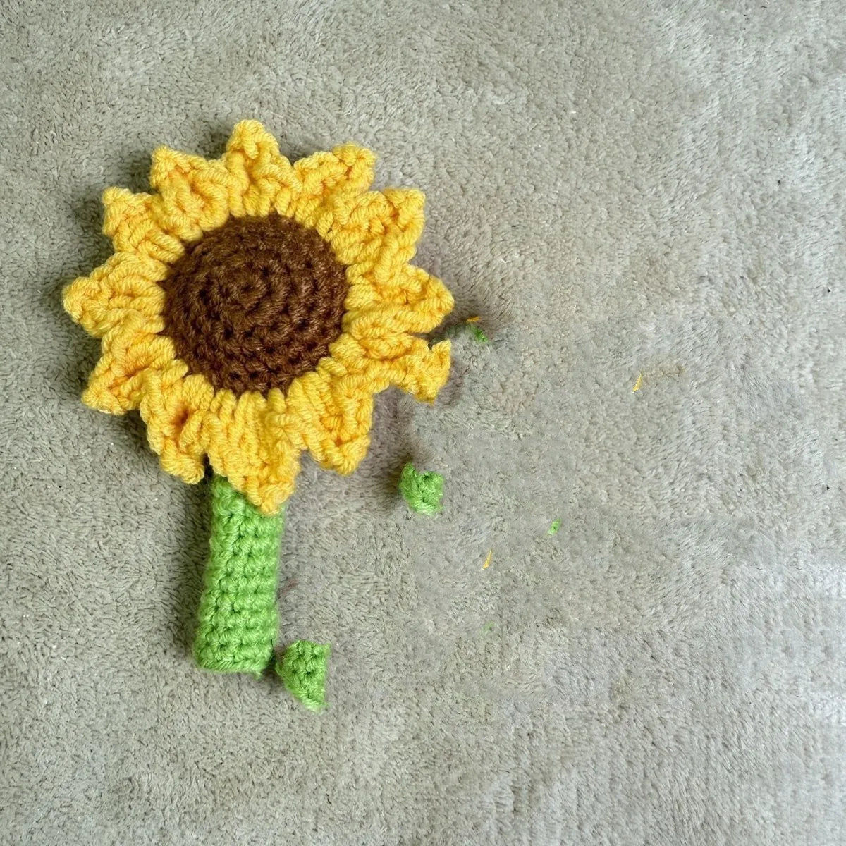 Hand-woven sunflower pen cover for teachers with crochet construction
