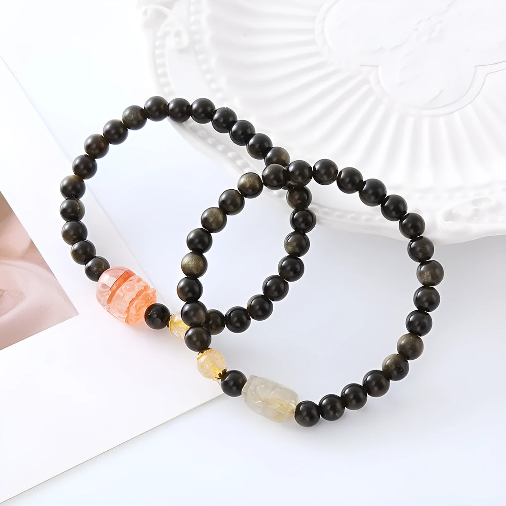 Handmade natural obsidian Pi Xiu bracelet with ethnic zodiac design in gold or red colours