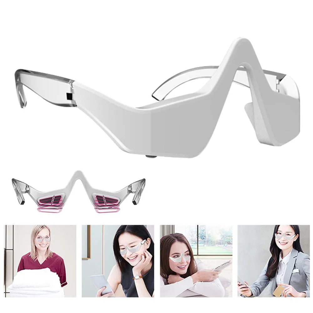 Pink and white 3D micro-current eye massager with glasses-style design on a grey background.