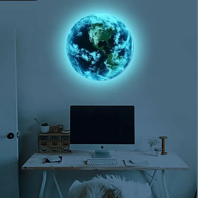 Glow in the dark 3D planet Earth wall sticker in various sizes on a blue wall