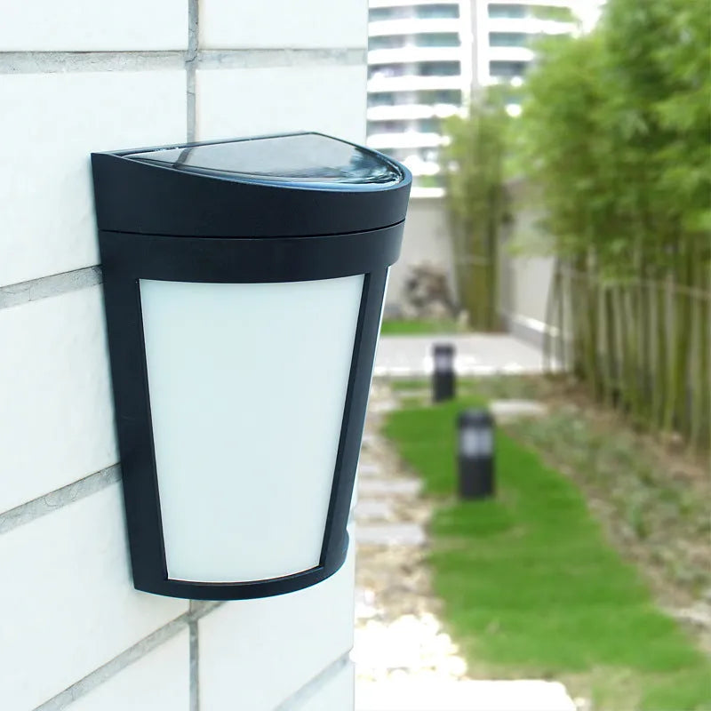 Solar wall lamp with 6 LED lights in IP65 waterproof housing for outdoor garden and courtyard illumination