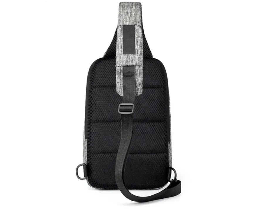 Dark blue Oxford cloth chest bag with a zipper and adjustable strap, shown from the front.