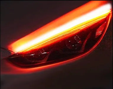 Car LED daytime running light strip with silicone body and coloured flowing turn signal effects