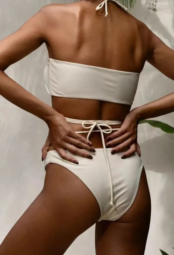 Black women's two-piece bikini swimsuit with lace-up front detail on the top.