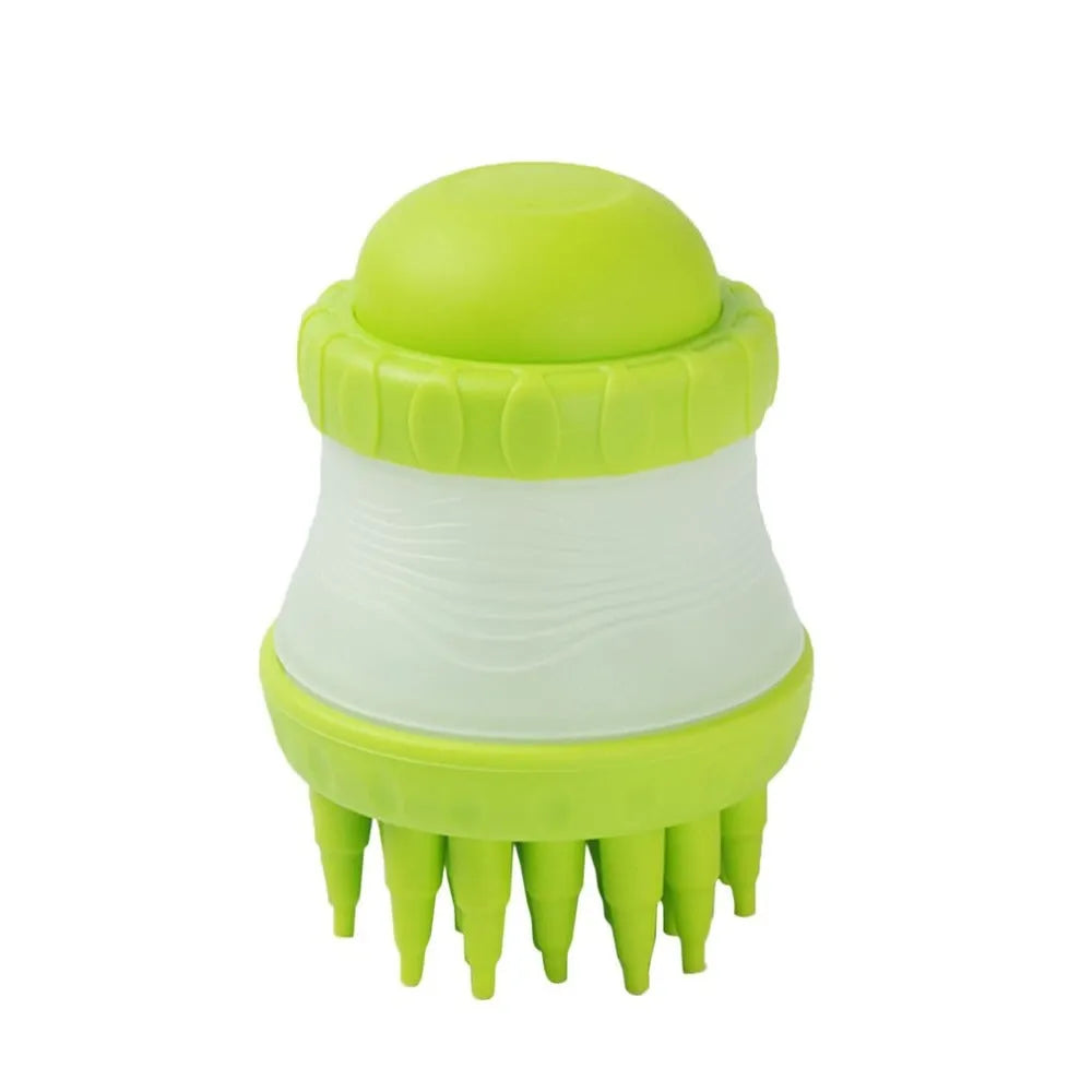 Silicone dog washing brush with built-in shampoo reservoir in blue on a white background