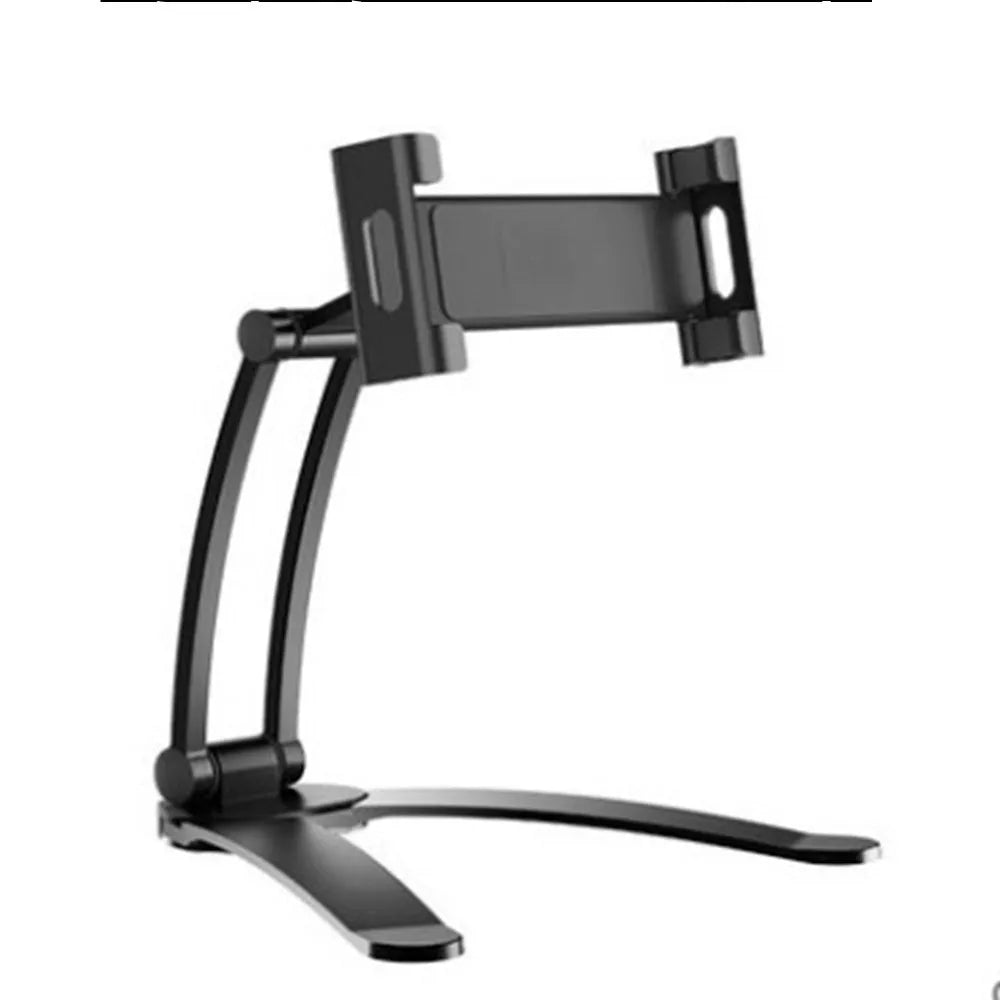 Silver aluminium alloy tablet stand with adjustable black clips holding a tablet, showing 360-degree rotation on a wooden desk.