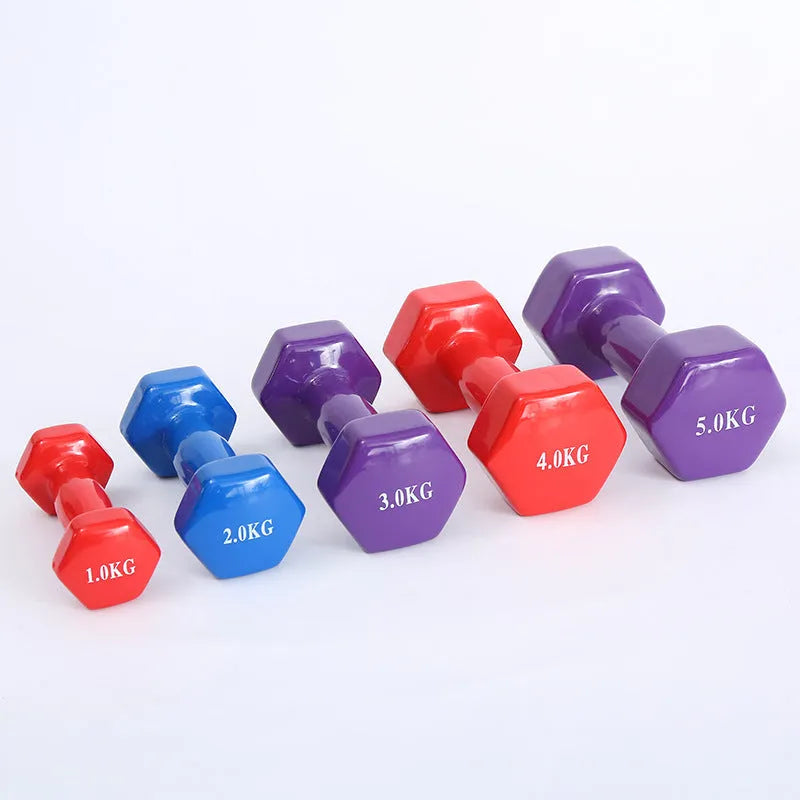 Bright coloured plastic-coated fitness dumbbells for home exercise with floor protection