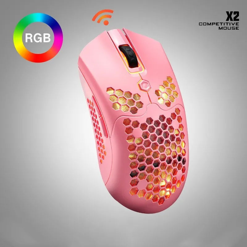 Free Wolf X2 wireless gaming mouse in black on a mouse mat, showing RGB lighting on scroll wheel.
