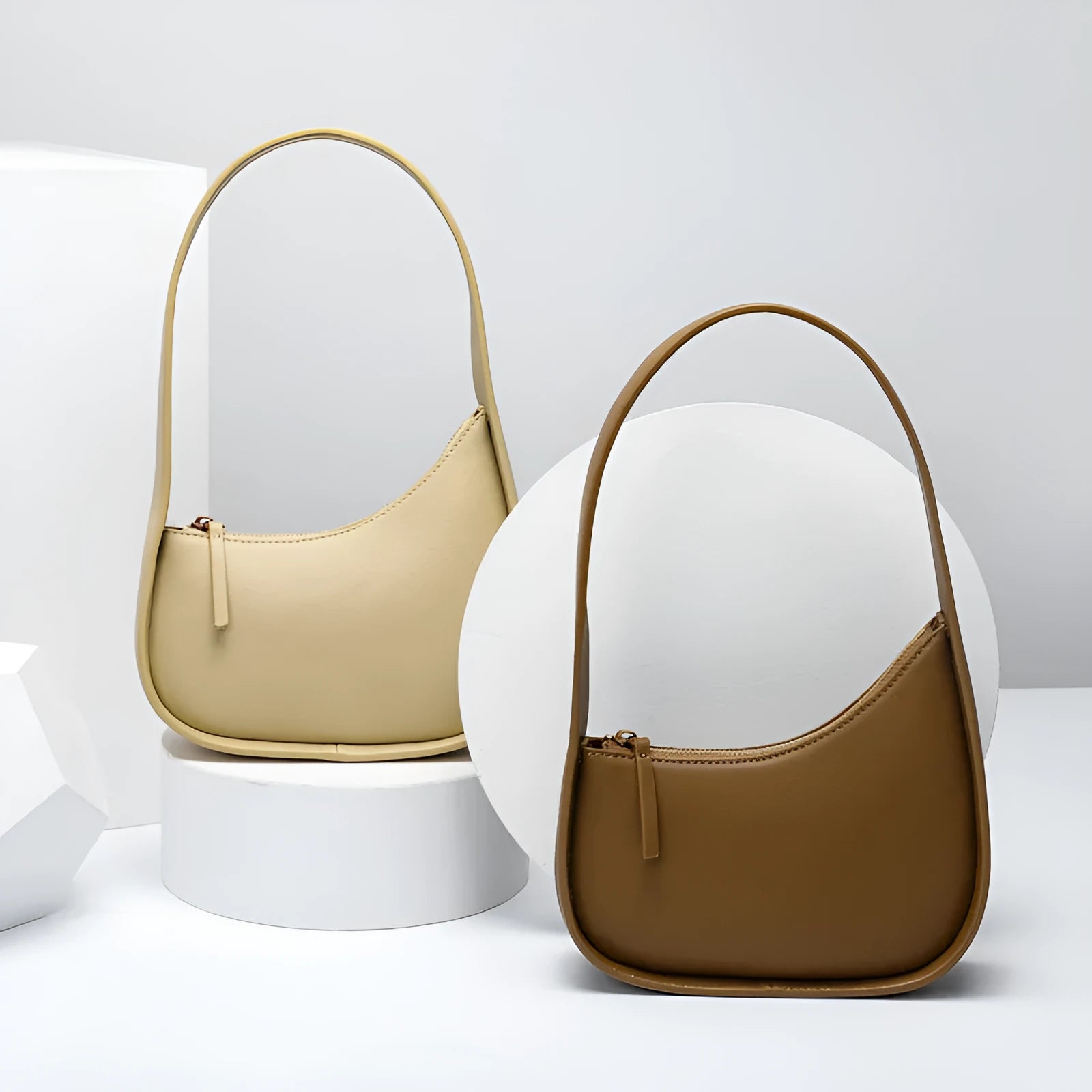 Small leather half moon shoulder bag with wide strap in four colour options
