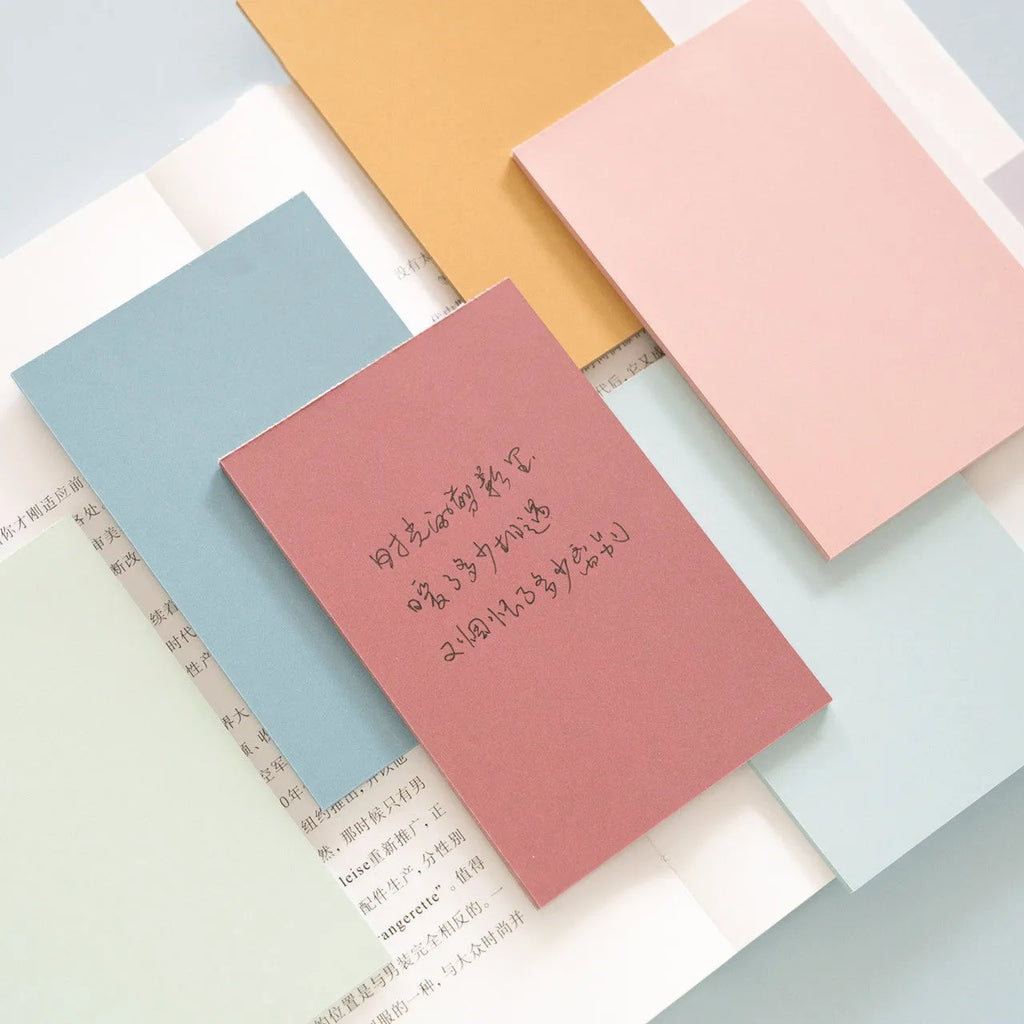Pack of large 12cm x 8cm Post-it sticky notes in six different colours.