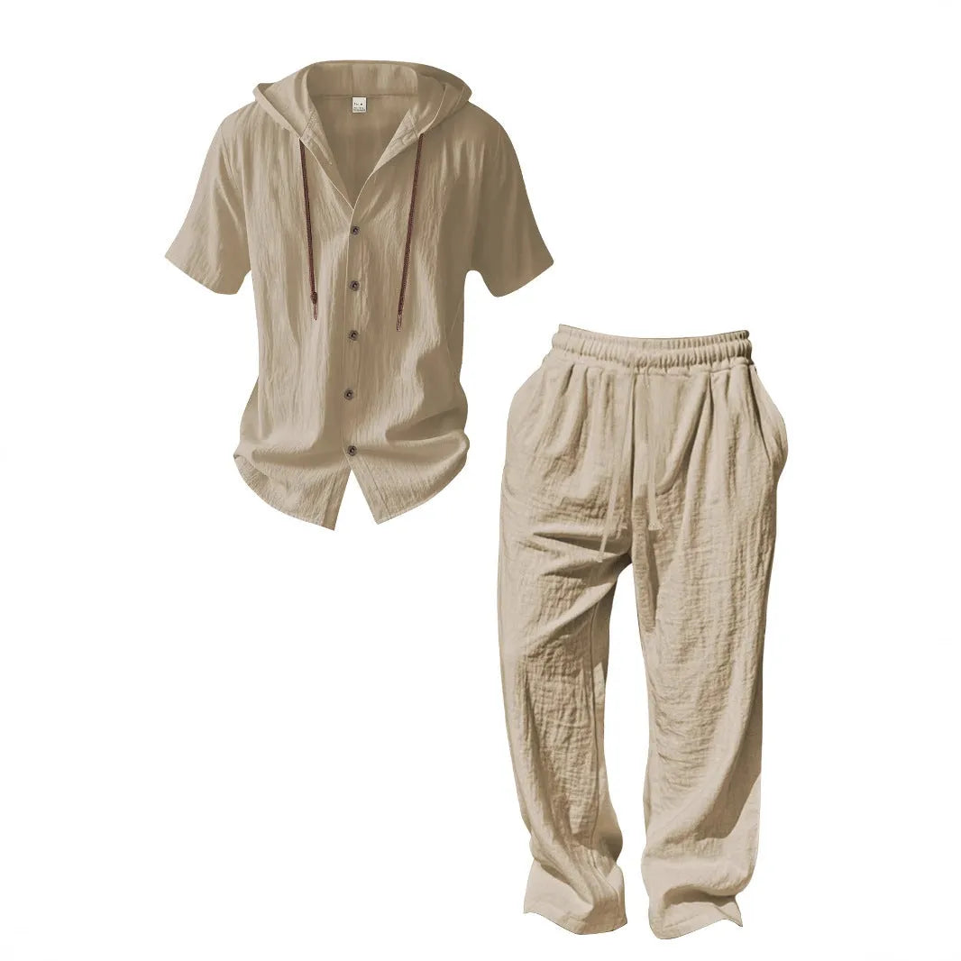 Men's cotton tracksuit set in grey, showing long sleeve top and matching trousers laid flat.