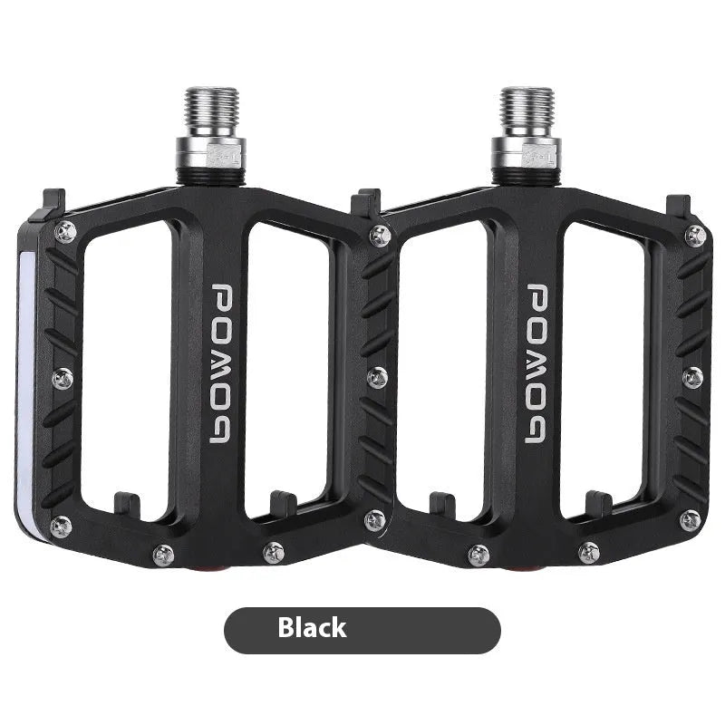 Pair of aluminium alloy bicycle pedals with integrated 710 LED lights in a choice of colours.