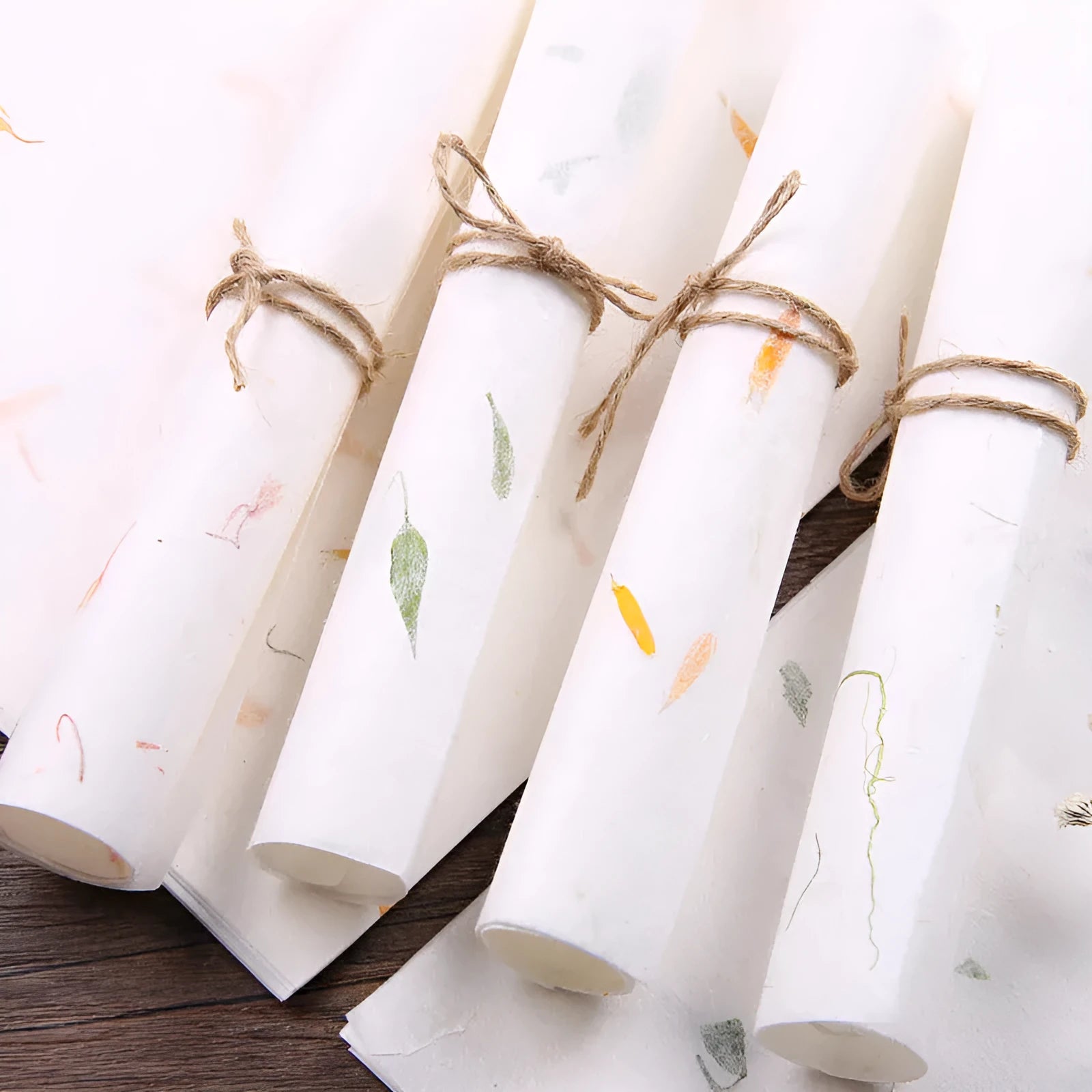 Ten sheets of Chinese-style painting paper in Green leaf design, each measuring 27.5 by 16.7 cm.