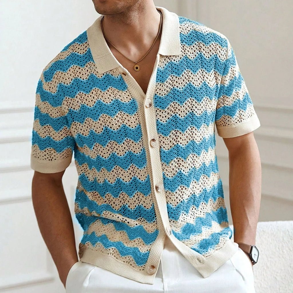 Man wearing a blue short-sleeve corrugated knit sweater with a hollow jacquard pattern, showcasing texture.