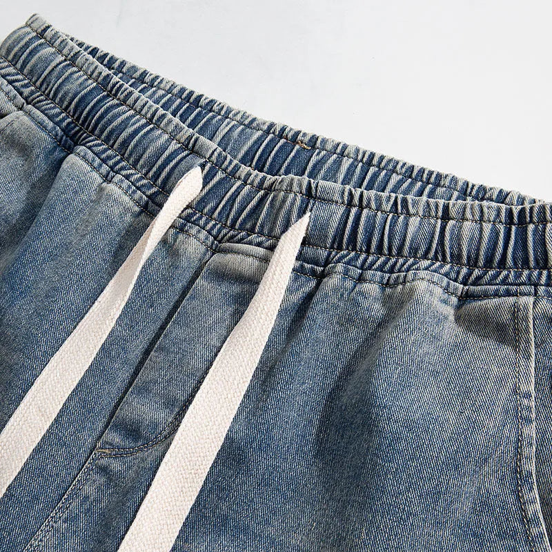 Hong Kong style retro heavy wash distressed loose jeans in blue cotton for teenagers