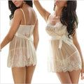 White spandex lingerie set laid flat, showing its sleek design.